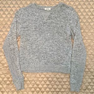 Garage pullover sweater, detail on back underside of arm for subtle style